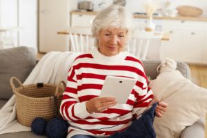 Senior Knitting with Tablet