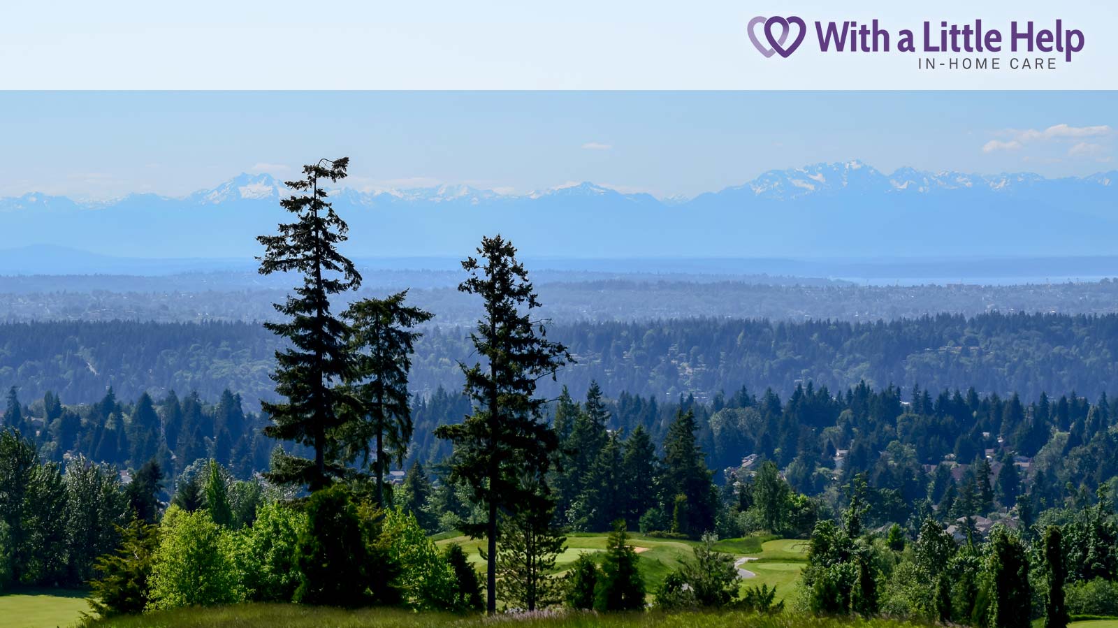 Scenic golf course in Newcastle, WA with mountain backdrop, near families who rely on in-home senior care.