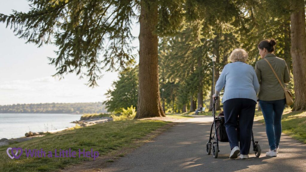 An older woman walking with her caregiver in a park as part of a senior care plan that adapts to changing mobility.