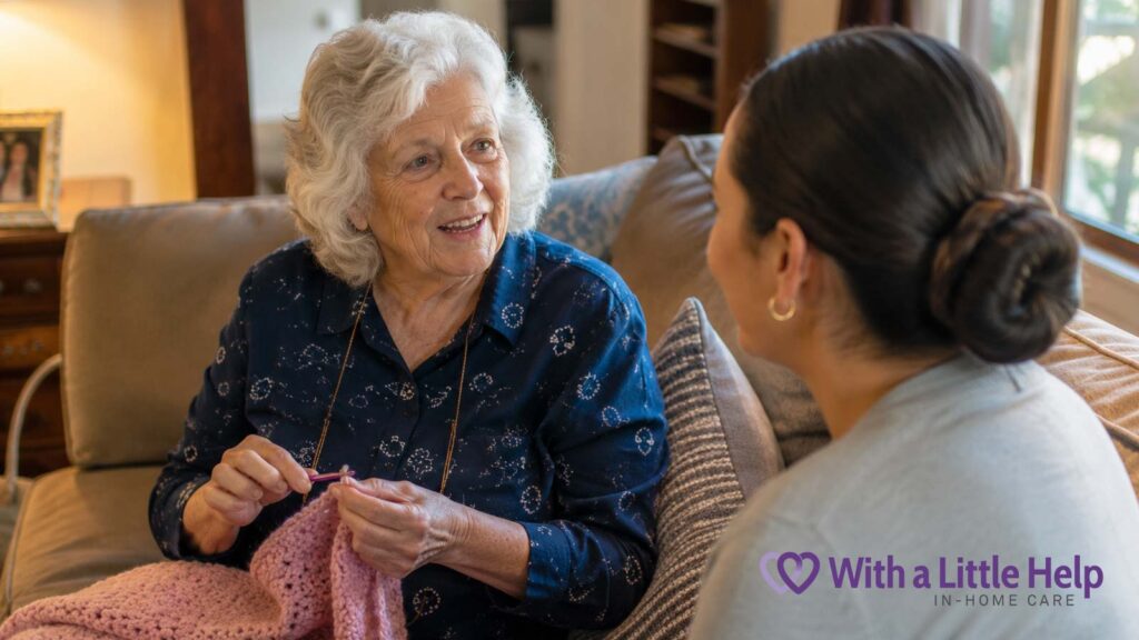 An older woman crocheting while talking with her caregiver as an example of personalized senior care plans focused on her interests and routines.
